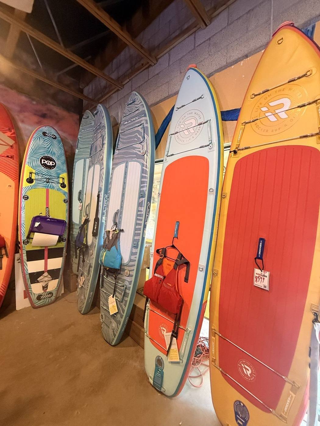 POP Board Co. and iROCKER paddleboards in the shop